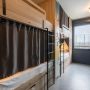 lits-en-dortoirs-salle-de-bain-casiers-linge